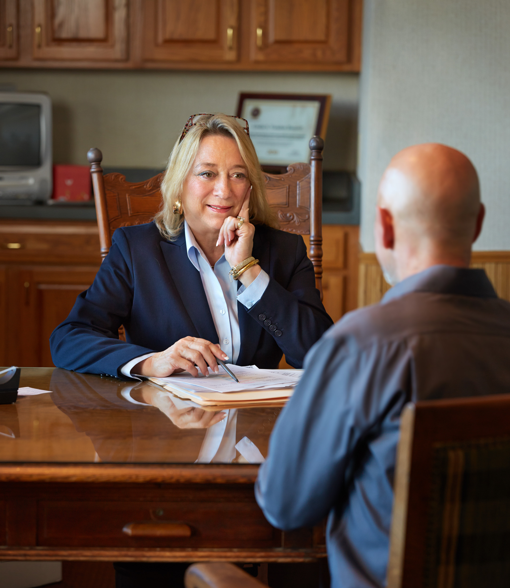 Linda meeting with client at VHD Law